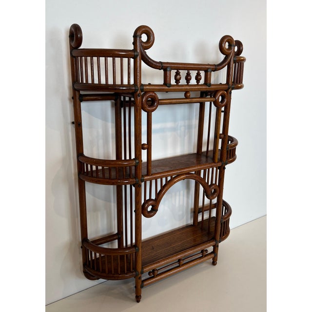 This very beautiful, interesting, and rare shelf is made of bentwood and brass. It is an Austrian work of art and...