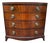 Late 20th Century Georgian-Style Bowfront Flame Mahogany Chest of Drawers by Baker Furniture. For Sale