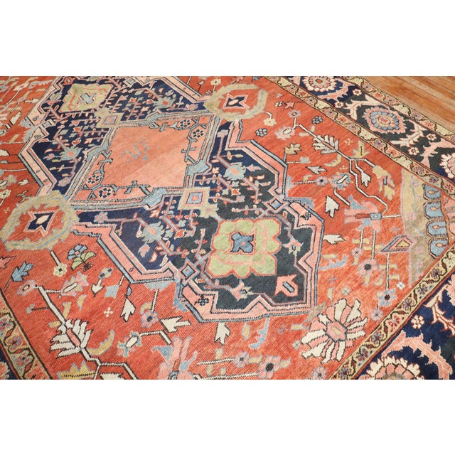A magnificent and early Heriz. Never before seen large scale design with a rare signature inside the medallion. Highly...