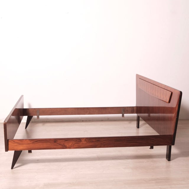 Beautiful and elegant double bed frame, with refined relief decoration on the headboard, originally designed and produced...