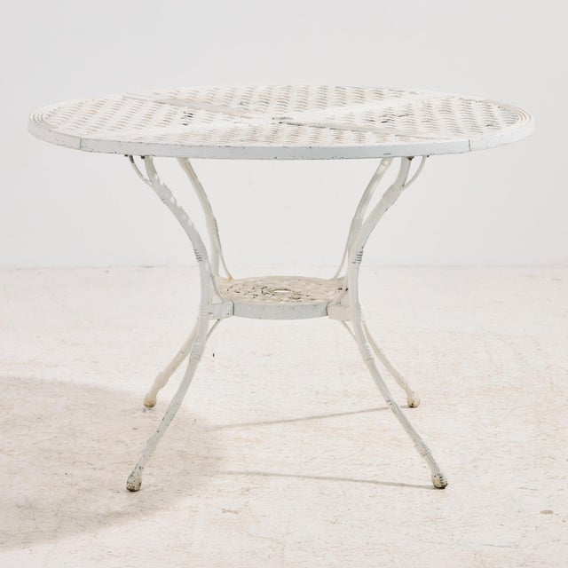 Vintage garden set in cast aluminium with a bamboo- and rattan-effect surface from the 1970s. The set consists of five...