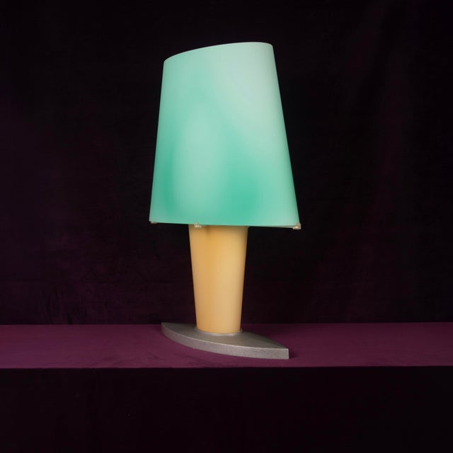 An elegant and highly distinctive Model 2850 table lamp, designed by Daniela Puppa for Fontana Arte in 1991. Characterized...