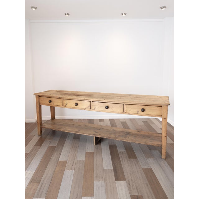 Dimensions:&nbsp;96"W x 21.5"D x 34.25"H A wonderfully worn and beautifully functional antique pine pot board dresser...