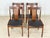For sale is this beautiful set of four Scandinavian mid-century dining chairs made of high-quality teak. The distinctive...