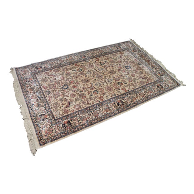 Vintage Karastan 100% wool area rug / mat / carpet featuring a floral motif inspired by palmettes and scrolled vines with...