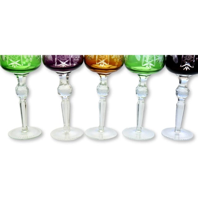 Set of 5 Bohemian cut crystal wine stems. Finely cut pattern on stem. Original set, all in same pattern. No maker's mark.