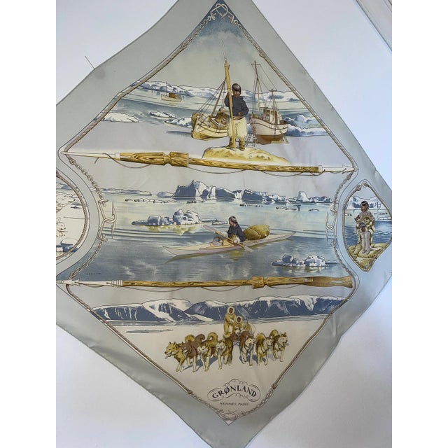 HERMES GROENLAND Silk scarf this pastel blue scarf is very comfortable to wear. The Greenland theme is in perfect harmony...