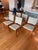 This set of Mid Century Modern Teak Johanes Andersen-style chairs by D-Scan includes two armchairs and four side chairs....