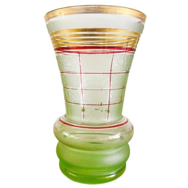Beautiful Art Deco Booms vase in green glass made by Rupel with red and gold lines from the 1930s. The Art Deco vase is in...