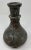 Antique Islamic metal copper hookah bottle base of spherical form and decorated with a recessed repeated floral, geometric...
