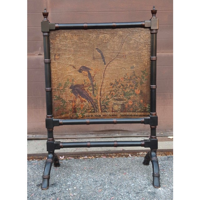 Chinese Black Painted Faux Bamboo and Gold Florals Fireplace Screen Chinese painted black fireplace screen with a faux...