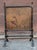 Chinese Black Painted Faux Bamboo and Gold Florals Fireplace Screen Chinese painted black fireplace screen with a faux...
