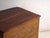 This antique Chinese trunk with painted flowers in elm is a dowry chest with a sliding lid and loose floral decoration. It...