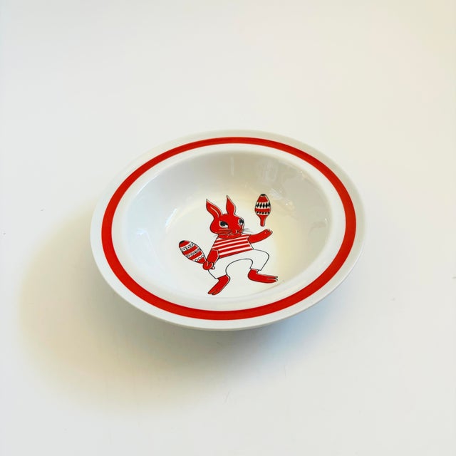 A mid century modern ceramic child's bowl by Arabia, Finland. A part of the "Sirkus" collection designed by Raija...