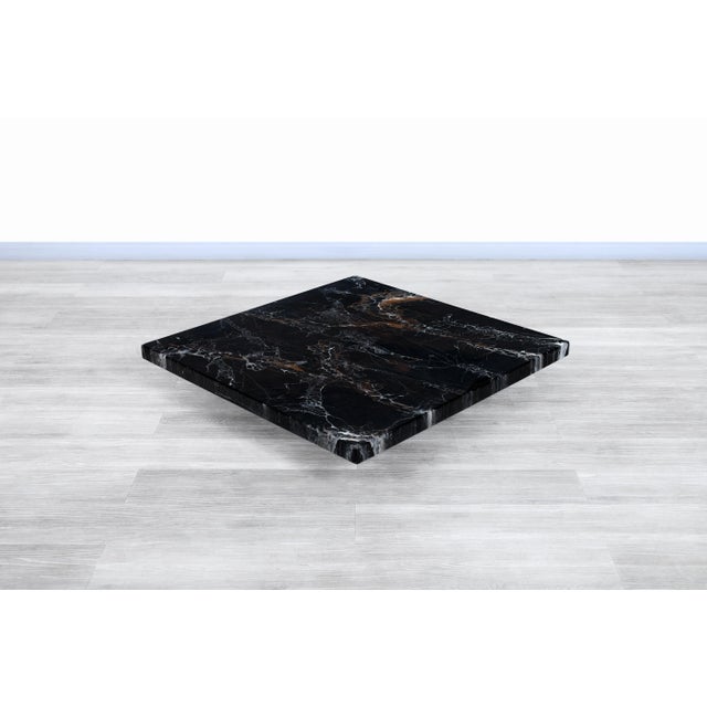 Designed by the legendary Italian designer Willy Rizzo, this striking coffee table captures the glamour that made his work...
