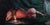 Respite by John McLeod | Oil on panel Nude figure resting beside a candle on a dark surface. For Sale