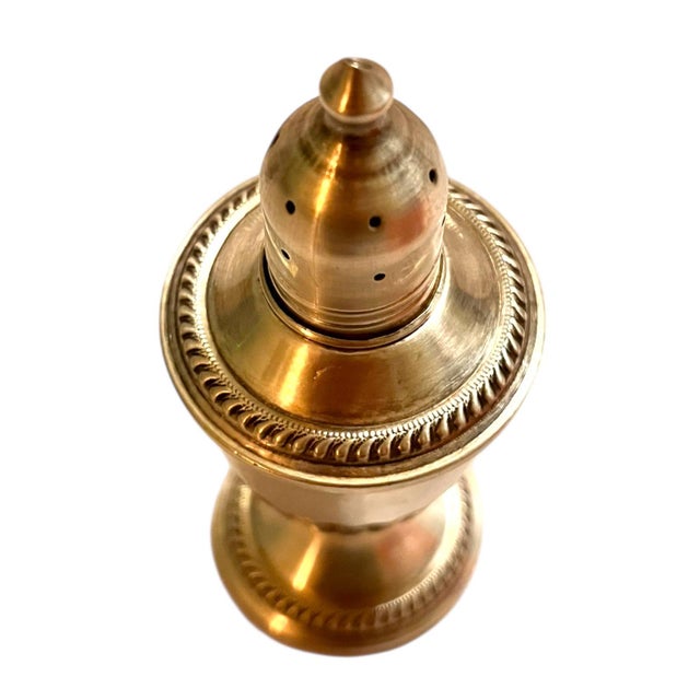 Elegant sterling-weighted salt shaker lined with glass. Great condition. Can be used as a salt shaker or remove the lid,...