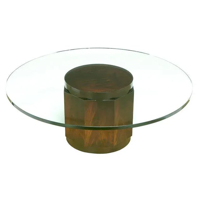 Shallow mahogany cylinders provide the base and cap to a central octagonal body of flame mahogany. New glass top is forty-...
