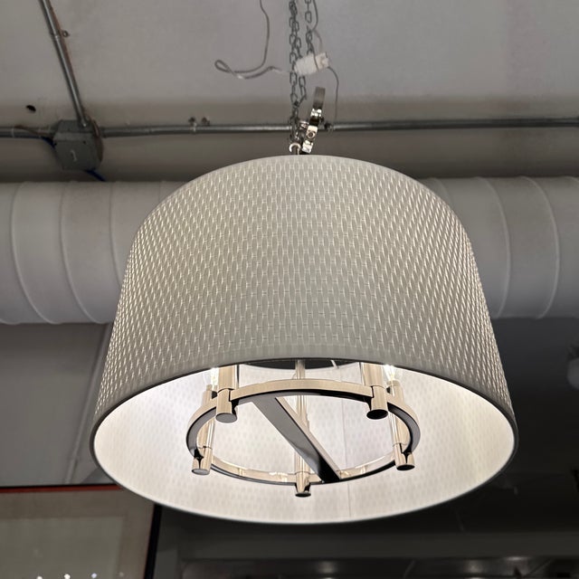 Design Plus Gallery presents the Palmetto Collection Polished Nickel Pendant from Minka-Lavery. A wide drum shade is...