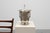 A refined Art Deco equestrian‑themed champagne bucket, crafted in France in the 1930s, distinguished by its sculptural...
