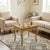 Small antique table. The top rests on four curved legs, culminating in a curl. The removable tray, carved with scrolls and...