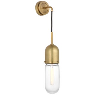 Thomas O'Brien for Visual Comfort Signature Junio Wall Light in Hand-Rubbed Antique Brass with Clear Glass For Sale