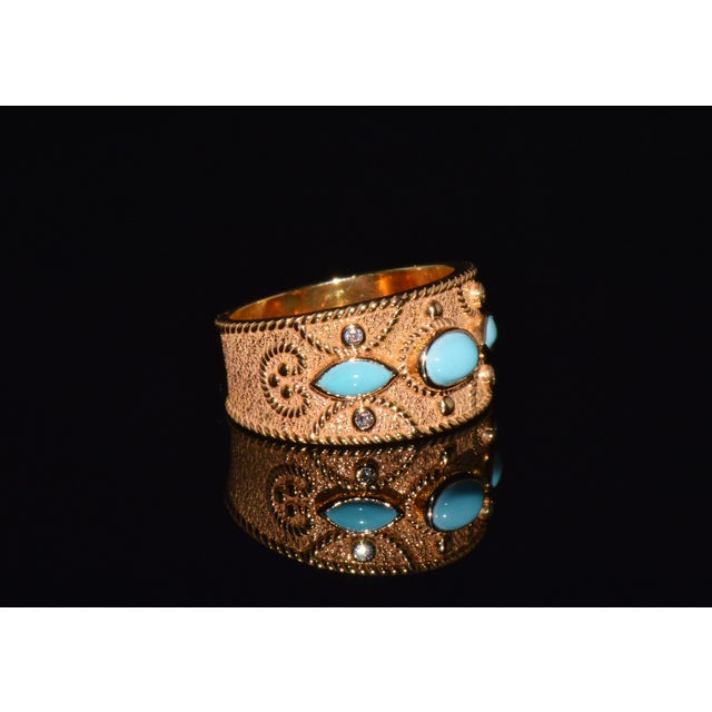 Gorgeous natural 18K solid gold 0.06CTS diamond and 0.80CTS turquoise Etruscan / Greek revival ring. This finely crafted...