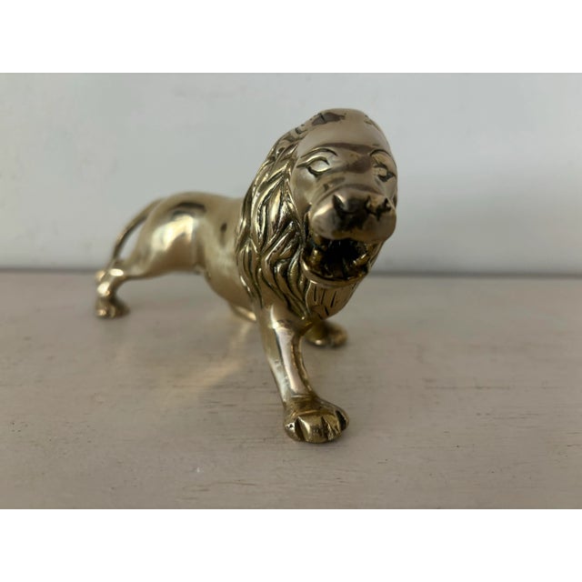 A striking decorative object, this vintage English brass lion exudes strength and elegance in equal measure. Beautifully...