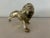 A striking decorative object, this vintage English brass lion exudes strength and elegance in equal measure. Beautifully...