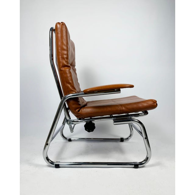 This is the chair your living room has been missing. A 1970s tubular chrome recliner (probably french or german) that...