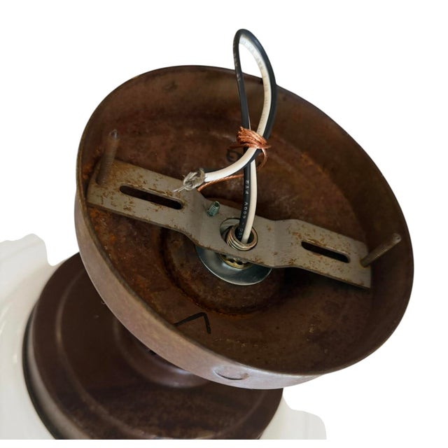 A great flushmount with rustic holder that will look good in any style home. Circa 1920’s.