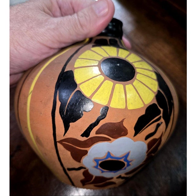 Mael: Art Nouveau ceramic spherical vase with painted decoration Signed under the base