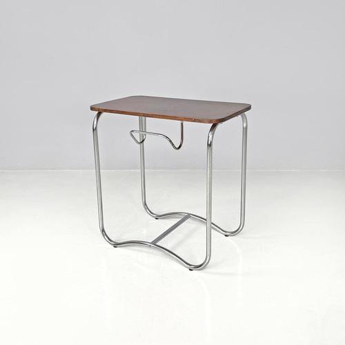 Italian mid-century modern wood and metal coffee table with newspaper hook 1950s Coffee table with rectangular wooden top....