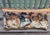 A charming decorative pillow crafted from an exquisite 18th-century tapestry featuring a striking pattern of large,...