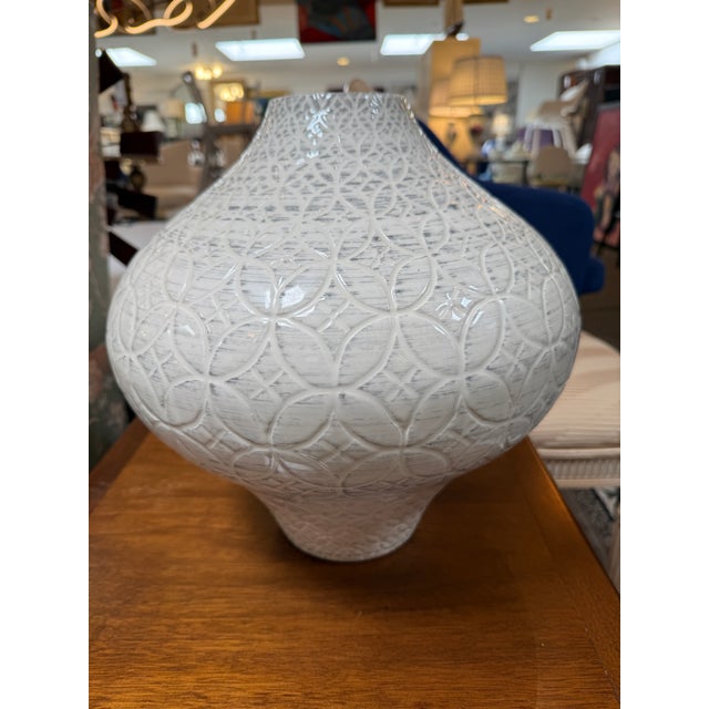 Design Plus Gallery presents the Geo Vase from Crate & Barrel. Geo's dramatic curves showcase its lacy stamped pattern,...