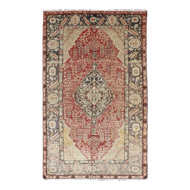Antique Turkish Oushak Rug in Deep Rose and Charcoal With Ivory Medallion 4′4″ × 7′2″ For Sale