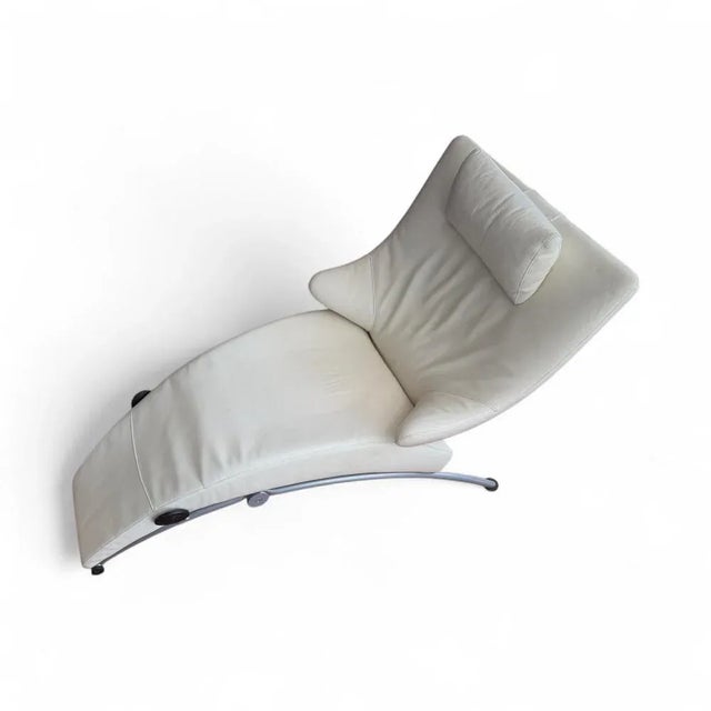The Solo 699 armchair from WK Wohnen is upholstered in off-white genuine leather and sits on casters. Its practical...
