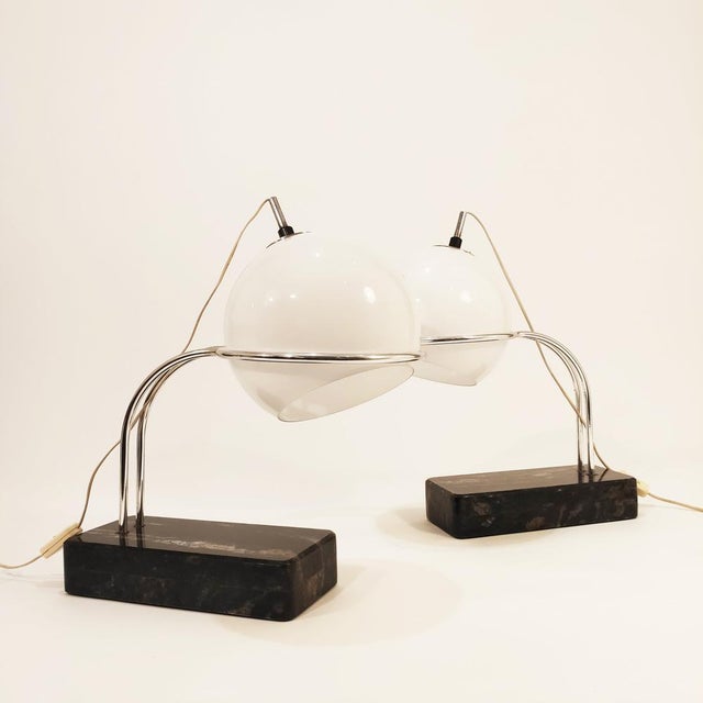 Couple of table or desktop lamps in the style of Joan Antoni Blanc for the section section, 60s. Black marble base veined...