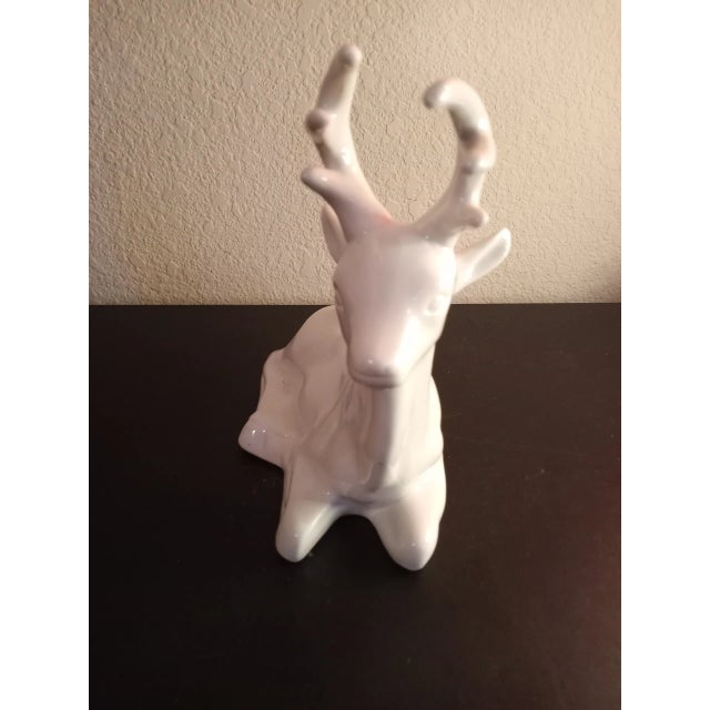 This is White Porcelain 8" Deer Figurine Procured at auction BOX D