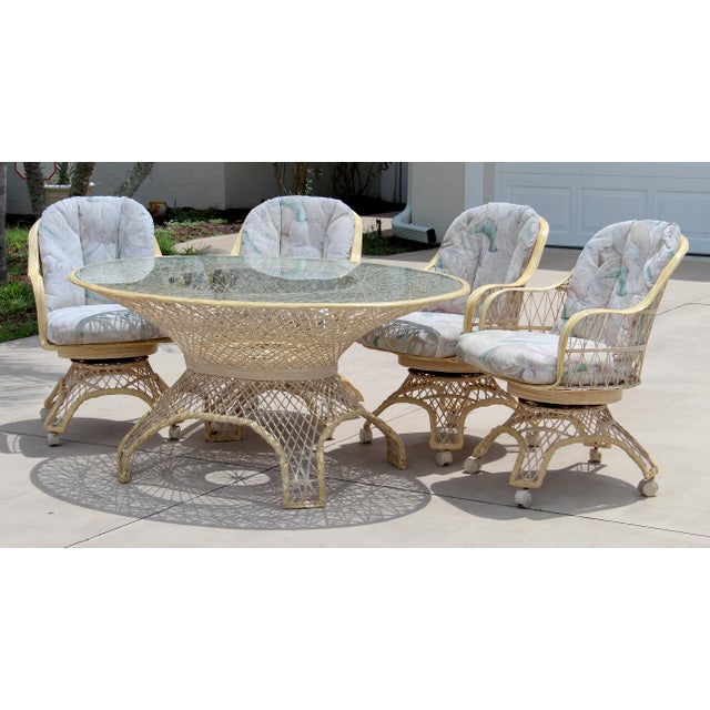 Bring iconic Mid-Century Modern design to your home with this exceptional Russell Woodard five-piece spun fiberglass...