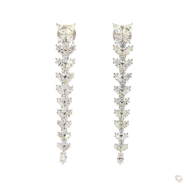 These estate earrings from our contemporary estate collection centers on a 1.61-carat diamond in a round brilliant cut for...