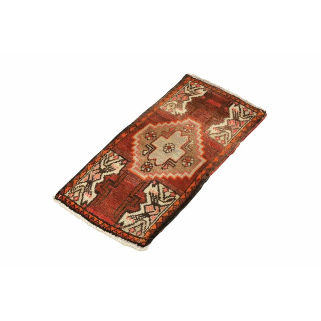 Vintage Handknotted decorative mini rug from Kars region of Turkey. Approximately 45-55 years old. In very good condition.