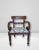 This refined pair of early 19th-century Regency-style mahogany accent chairs exemplifies the elegance and restraint of...