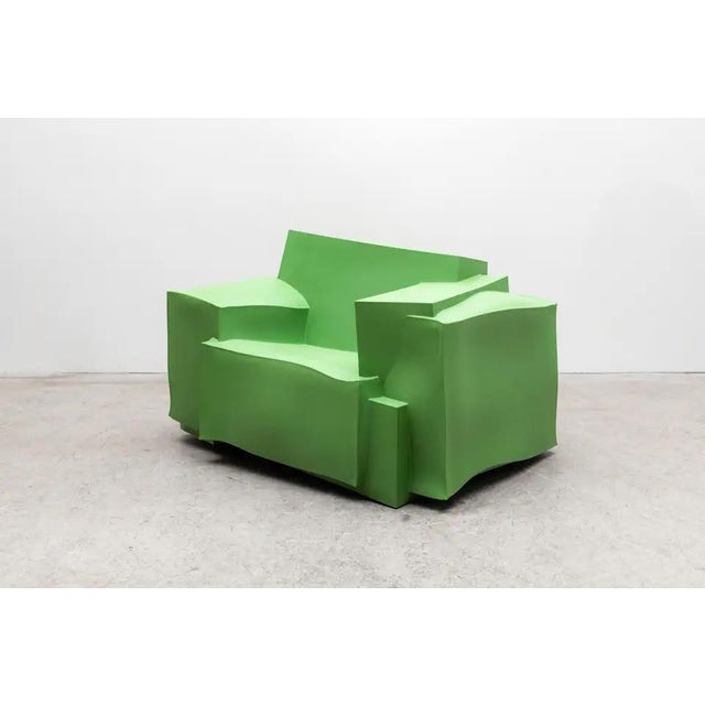 Sculptural green armchair designed by Dror Benshetrit for Cappellini in collaboration with Walt Disney Signature, inspired...