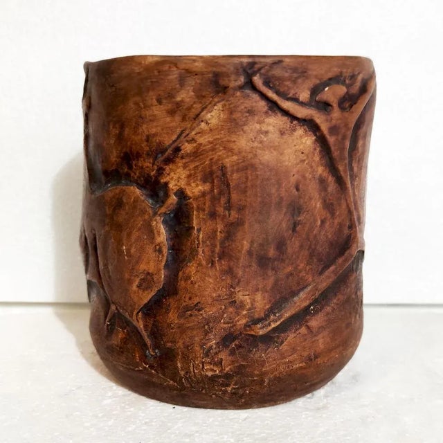 Ca D'Oro, Luisa Ronchini ''Hunters and the bull'', vase with relief decoration in terracotta, h cm.15,5x13,5, 1965 This...