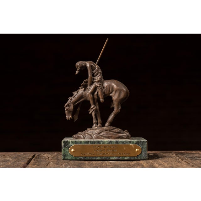 Artist: James Earle Fraser Date: c. 20th century (after 1915 original) Medium: Cast metal with marble base and brass...