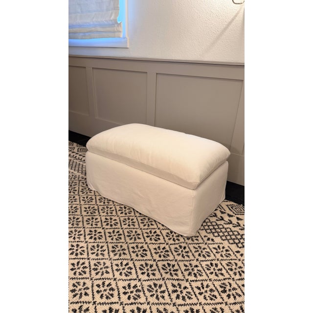 Ever at the ready for everyday life, this storage ottoman exemplifies designer Leanne Ford's relaxed aesthetic. Floating a...