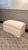 Ever at the ready for everyday life, this storage ottoman exemplifies designer Leanne Ford's relaxed aesthetic. Floating a...