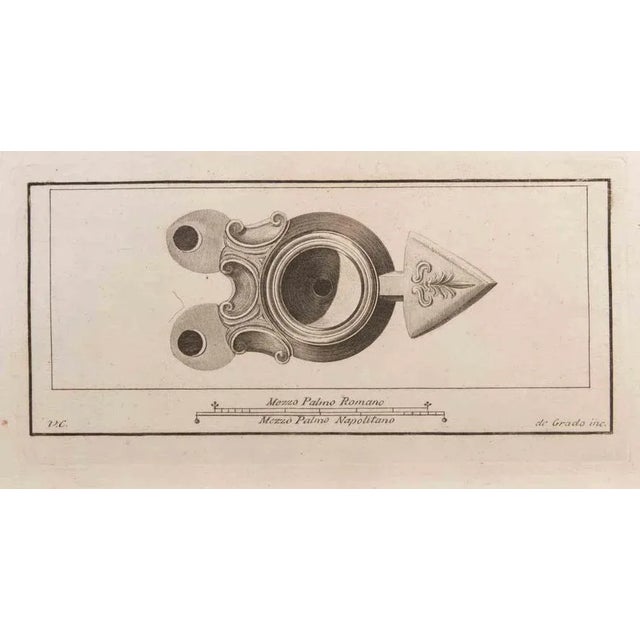 Oil lamp with decoration is an etching realized by filippo de grado (1705-1780). The etching belongs to the print suite...