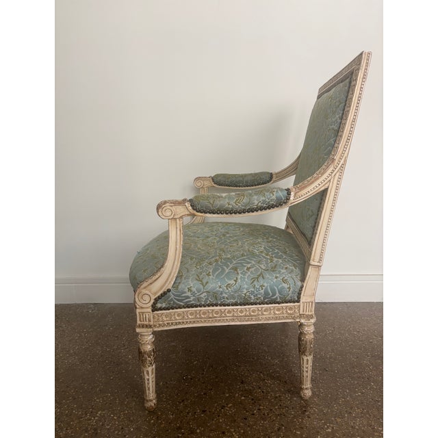 A 19th century French giltwood armchair. Finely carved with nice patina.